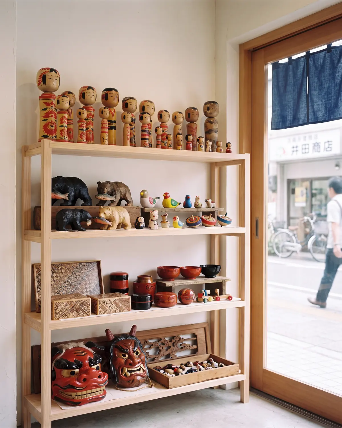 Kokeshi, carved bears, marquetry boxes and festival masks — one block, no joins.